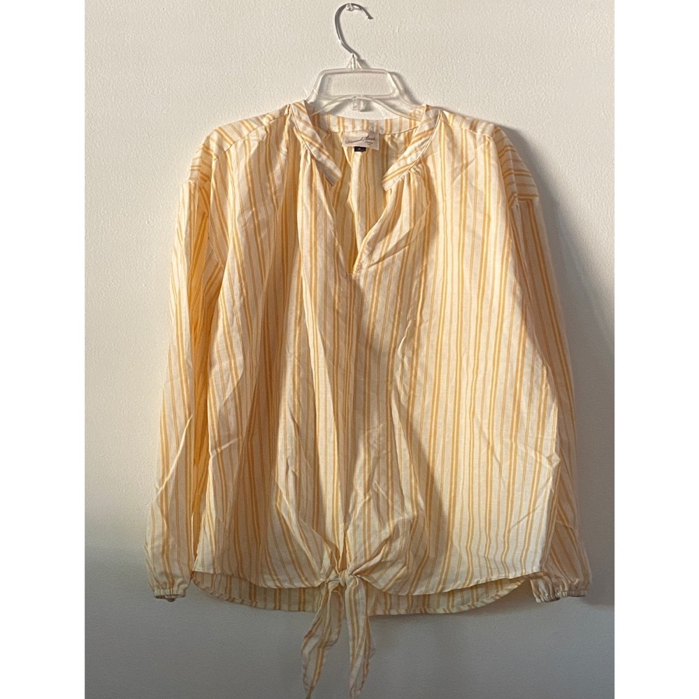 yellow striped blouse